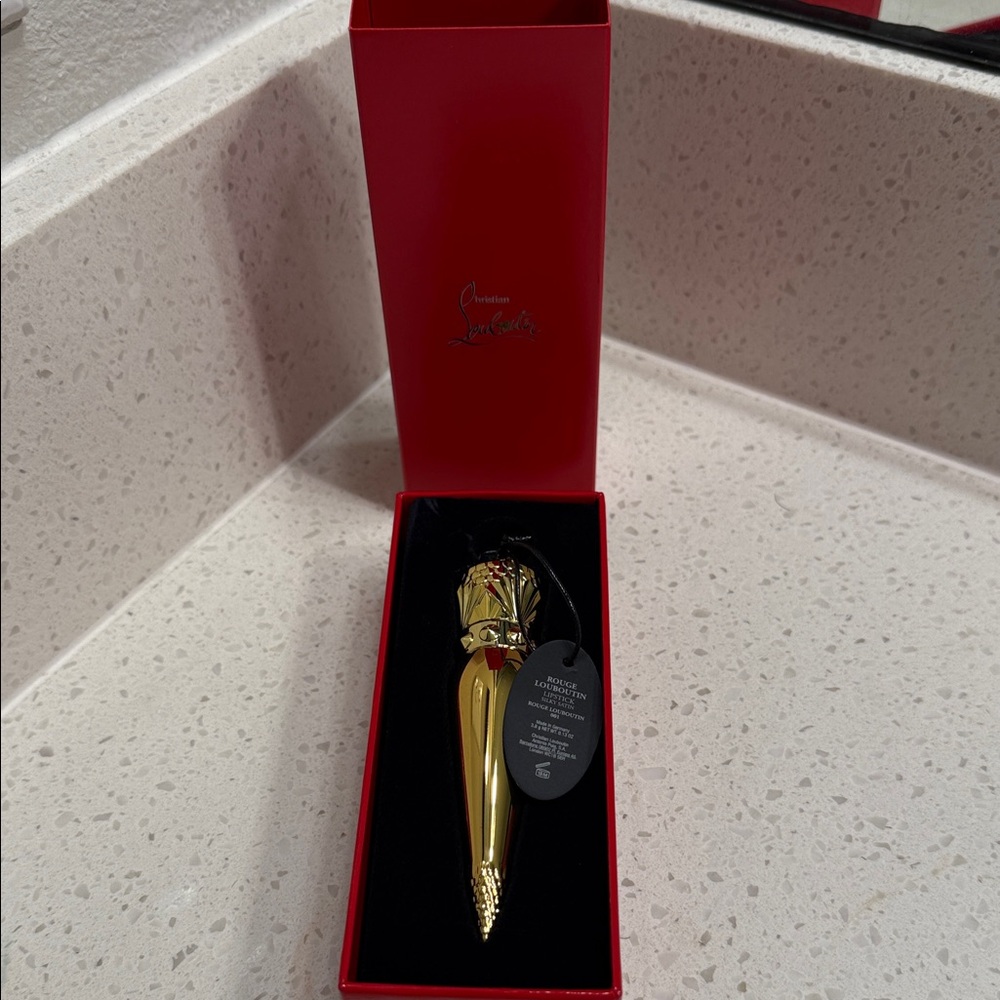 Christian Louboutin Gold Lipstick in Red Packaging